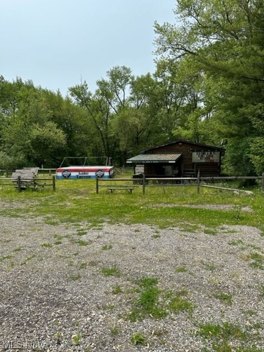 Best of both worlds!  Waterfront and 315+ feet of frontage on a main thoroughfare!
Improved land with 600 amp electric service at the road, commercial septic, water, and gas.
Barn on property with horse stalls.
House on property is uninhabitable but can be used for storage.
Ideal for commercial or residential opportunities!
Additional Parcels:  35-017402. 35-017403, 35-017404