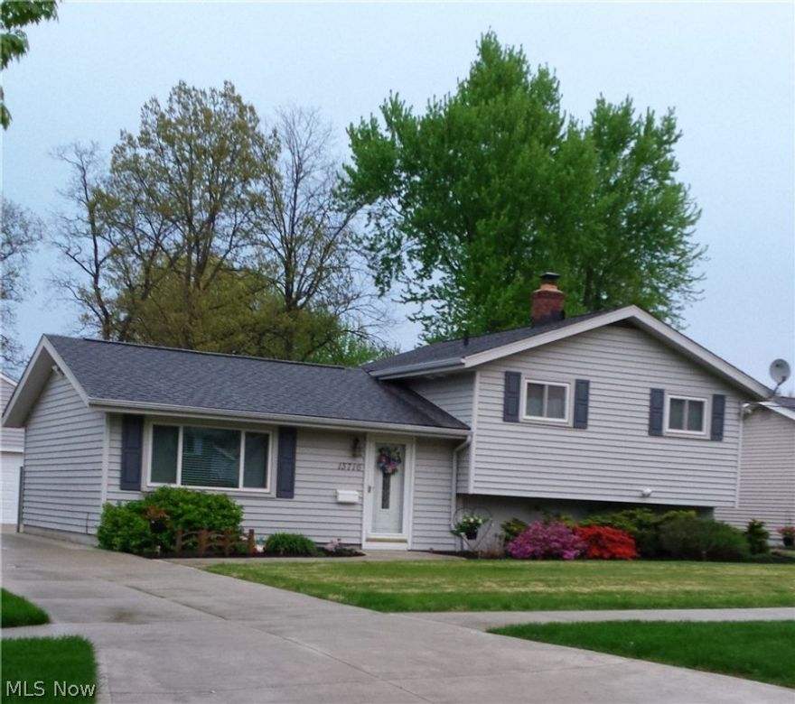 Welcome home to this house where all the major things have been taken care of for you.  Compete tear-off and new roof in 2014. All new concrete driveway and backyard patio area in 2007. New garage with plenty of storage space, garage door opener and keypad entry built in 2007. A/C and furnace replaced in 2008. The lower level has a finished family room, a door to walk out towards the backyard, and an unfinished space with washer/dryer, utility tub, hot water tank and furnace/air conditioner.  Kitchen was remodeled several years ago including an attractive laminate floor. Newer carpet and neutral colors throughout most of the house.  Hurry!  A house in this condition will not last long.