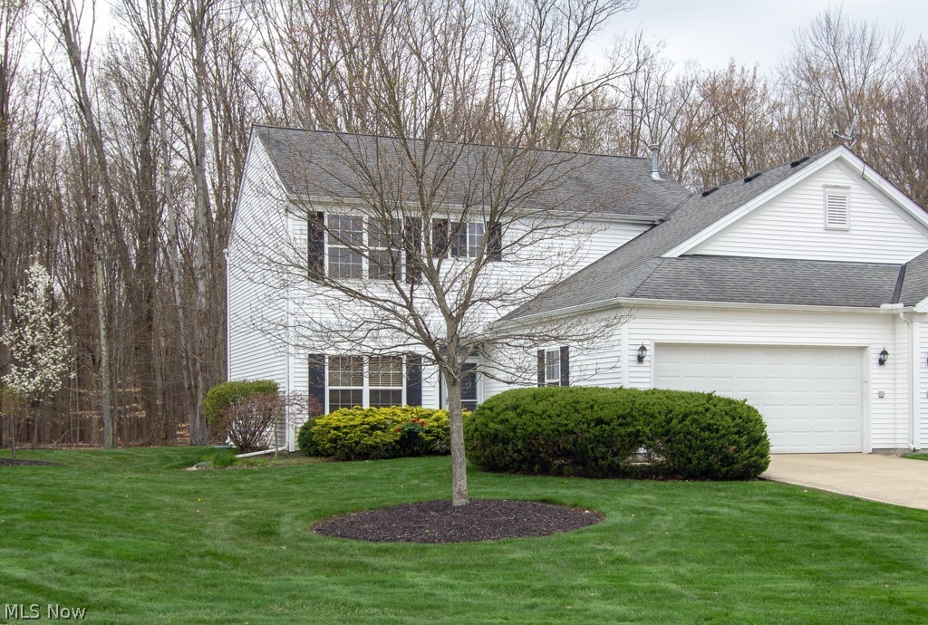 Move in ready Colonial Townhouse in the Crossings of Pond Brook that features three spacious bedrooms plus a large first floor office. Two spacious full baths and a first floor half bath and laundry room. Large kitchen, great room and private patio overlook a wooded back yard. There is newer laminate flooring through out the home, new light fixtures and much of the interior has been recently painted. The Crossings has one of the most reasonable HOA fees of only $135.00 per month and new Reminderville Recreation center is just down the street from the development. The seller is offering buyer a $2000 credit to update kitchen appliance.