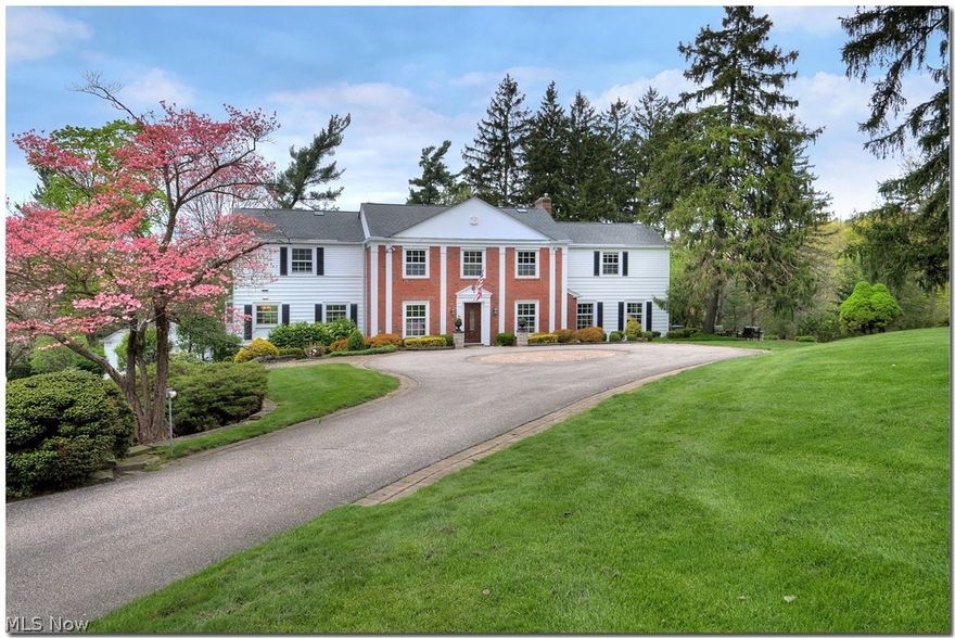 Amazing updated residence in the idyllic enclave of Daisy Hill!!  Present owner gave this classic colonial a current vibe.  Home is beautifully appointed with hardwood floors, expansive windows and fabulous vistas in all directions.  View the beautiful pool from the deck off the kitchen or the covered patio with heater and TV.   The large family room addition has an impressive fireplace and built-ins.  It is connected to the cozy, distressed-wood paneled den by a fully-renovated bar area with refrigerator drawers and wine storage.  The kitchen was updated and now has stainless appliances including a 6 burner Wolfe range.  
All four bedrooms are on the second floor.  The oversized master suite addition enjoys large windows providing terrific views.  A second floor home office is off the master bedroom.   
This property is a Daisy Hill gem.