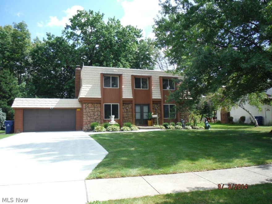 Ready to move in! Paver patio with fire pit along with storage shed in wooded back yard. Wood burning fireplace in family room. Finished basement.