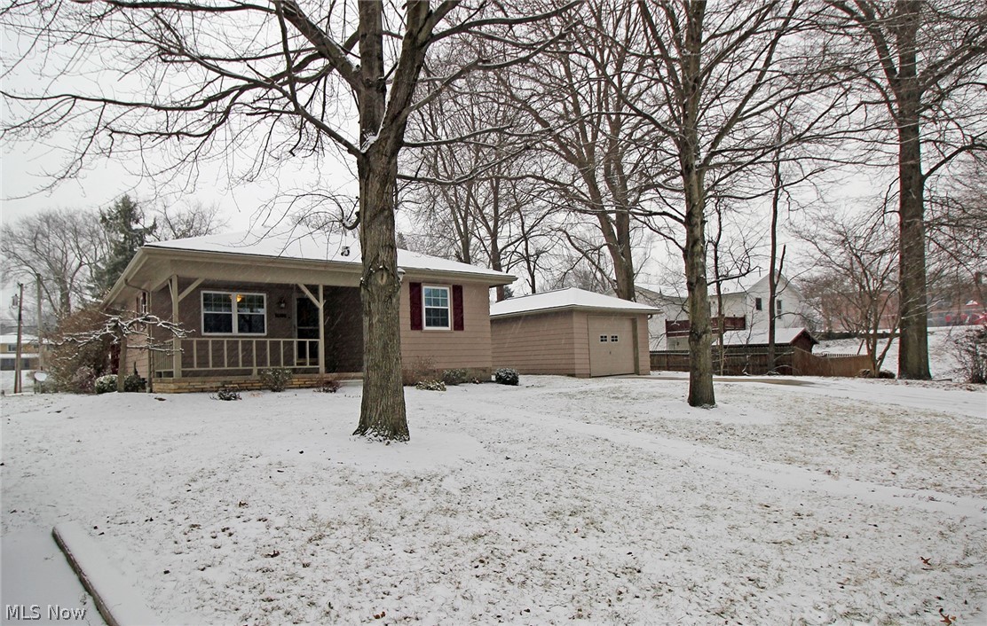 Neat home on unique lot! Lovely view of creek from rear deck or neighboring homes front porch. Newer roof, insulated windows and blown in insulation. Low utilities, great starter or retirement home. Detached one car garage. Home has a bedroom in the basement and a great laundry area.