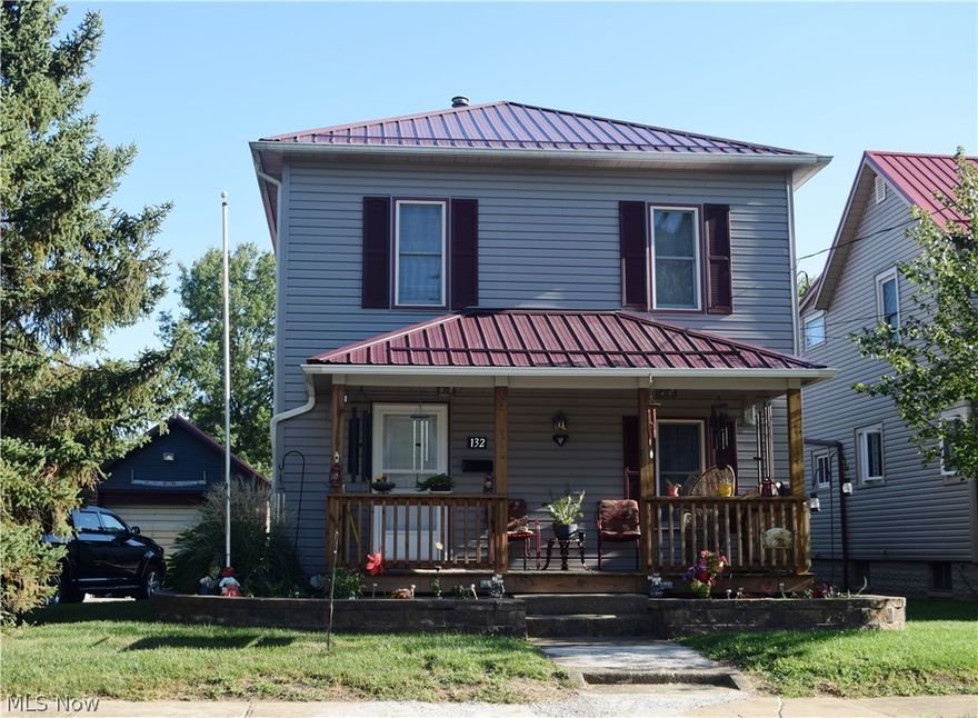 Beautifully remodeled century home with a 30X36 mechanics dream garage. This 3 bedroom home boasts 2 full remodeled bathrooms. First floor bath includes laundry hookup. The wood floors in the dining room and bedrooms ave been refinished. The updated kitchen includes a bar open to the dining room. This home has plenty of storage inside and a spacious living room. New metal roof July 2016, vinyl siding 2011, updated windows, updated furnace, updated electric are just some of the updates. The 30X36 garage is wired for 220. There is a second one-stall garage. This home is a must see!