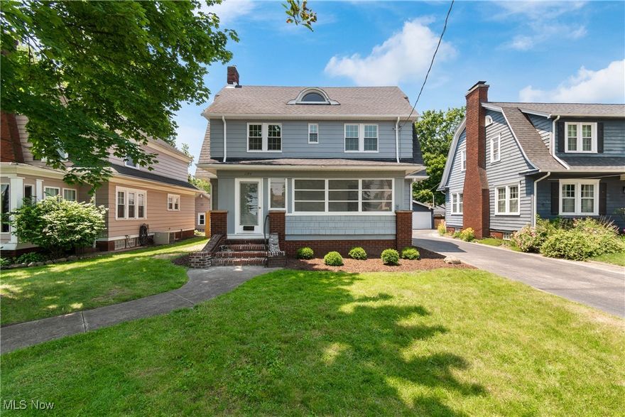 Outstanding colonial home on a quiet street. The backyard boasts a beautiful view of Cascade Valley Park, and it is just minutes to walking trails. This stunning home, built in 1924, feels brand new! Everything has been replaced, from the walls and flooring to the windows, plumbing, electric, and HVAC—the list goes on! A large living room and dining room exude old-world charm. The gorgeous kitchen features new cabinets, quartz countertops, and new appliances, all ready for you to step in to cook and bake. A nice-sized pantry in the hallway adds convenience. The nook is perfect for a small table to enjoy your morning coffee, or can be used as a mudroom. A half bath completes the first floor. The second floor has three spacious bedrooms that share a brand-new full bath with a beautiful tile floor. You can choose one of these bedrooms as a master or walk up to the third floor to find your own large master sanctuary with an ensuite. The basement includes a rec room and another half bath in the laundry area. If you want to fall in love with your first home or your forever home, this one is it! There's nothing to do but move in. Close to parks, walking trails, Route 8, public transportation, and just minutes to Akron, Cuyahoga Falls, shopping, and more!