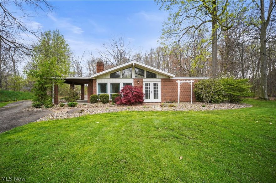 Adorable, updated 2-bedroom Ranch on private 5 acres. Enter the front door to the unique 2-level Living/Dining/Family room combination-you decide how to set it up with multiple options. We included virtually staged pictures as a dining room on upper level and living room on lower level, and as a 2-level living room/sitting/viewing rooms.  So many more options for you to pick from as you need. There's a beamed, cathedral ceiling with ceiling fan, track lighting, and front/back rafter windows in addition to the 3 large front windows, anchored by a gas fireplace with remote. All this is open to the eat-in kitchen with white cabinets, Corian counters, all appliances, built-in mini wine/glass rack, newer luxury vinyl flooring, and back door leading to covered patio with wood burning fireplace with cooking grates and a beautiful stone waterfall/fountain. Down the hall is the full bathroom with jetted soaking tub, new granite countertop vanity and newer lights/fan. Next is the laundry room with wall of built-in cupboards, washer and dryer, and ceramic tile floor. At the end of the hallway are the two bedrooms, both with ceiling fans and a combined walk-thru closet that serves both rooms. In back of the house is an oversized, heated 3-car garage with gravelled clearing beside and behind for plans for additional garage that never got built. There is also a shed with a lean-to and a fenced area for a garden.  In front of the house is a 9-ft deep stocked pond with dock and lit fountain on a timer. All this on a very private 5 acres where you can hunt or shoot in your own backyard!  Updates include carpet 2023, flooring 2021/2022/2023, paint 2023, windows ?2017 (with a couple front ones just replaced 04/24), H2O-50 gal 2015, bathroom 2024, all newer electric baseboard heaters with built-in thermostats 2021-2022, roof 2016, 200 amp electric, garage 100 amp. This is the perfect home for starting out or downsizing if you want lots of privacy! Make your appointment to see it NOW!