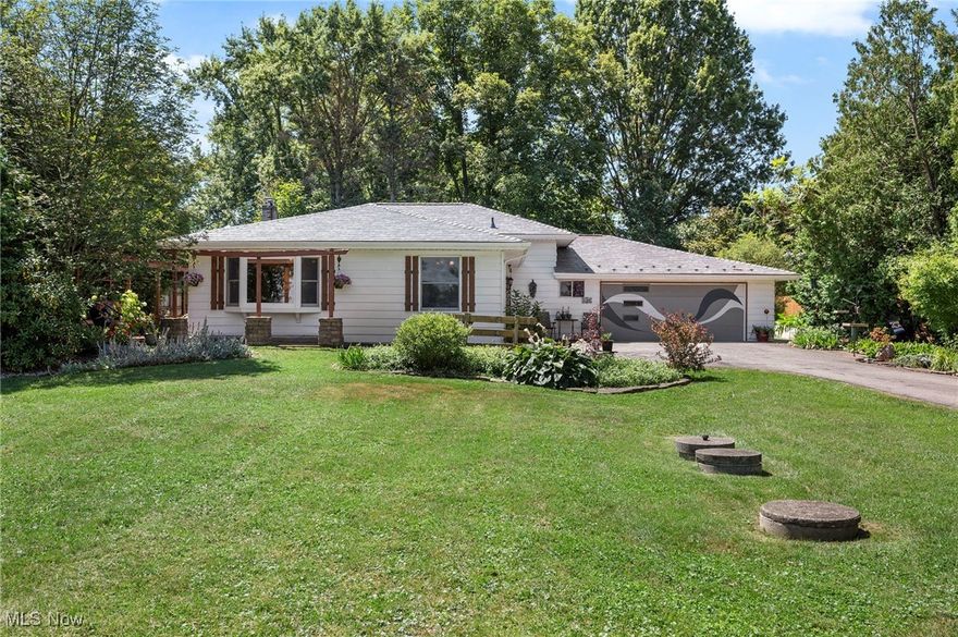 This well-maintained split-level home sits on a picturesque 1.14-acre property in Hinckley, featuring a private, parklike backyard with 3 patio spaces, built-in firepit, deck, and an enclosed 3-season room, perfect for enjoying the outdoors in every season. 
Inside, the home offers over 1,942 sq ft of living space with 3 bedrooms and 1.5 baths, including a finished lower level with a recreation room, bedroom, and half bath. The eat-in kitchen is equipped with granite countertops, tile and stone backsplashes, all appliances included, and a dinette area that shares a 3-sided gas fireplace with a family room and dining area. French doors lead from the dining area to a charming side patio with brick pavers and a built-in gas grill. The spacious owner’s suite features a sitting area, walk-in closet, private access to the deck, and an en-suite bath complete with a soaking tub and separate tiled walk-in shower. An attached 2-car garage provides access to the 3-season room and adds function with an epoxy floor, built-in shelving, and a workbench. Recent updates include: Installed metal roof (2016), replaced furnace (2021), hot water tank (2022), dishwasher (2024), washer (2017), dryer (2014), stove (2013), installed concrete patios, firepit, walkways & sitting area (2020), refinished epoxy floor in garage (2020), replaced window shutters (2021), professionally waterproofed the basement (2025), and much more. A detailed list of all improvements is available upon request. INCLUDED are ALL kitchen appliances, washer/dryer, gas grill, built-in shelves and workbench in garage, window treatments, and a 1-year home warranty. Conveniently located near I-80, I-77, I-71, OH-303, shopping, restaurants, golf courses, parks, and other local attractions.