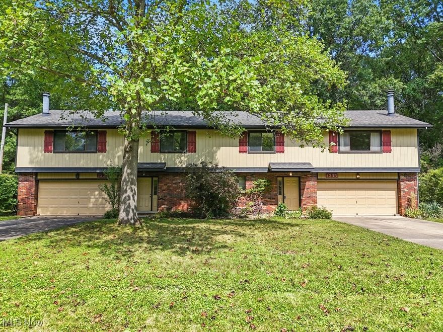 Fantastic Duplex Opportunity in Prime Stow Location! This duplex has been proudly owned by the same owner for the past 45 years and offers comfort, space, and investment potential just minutes from Route 8. Each unit offers a separate driveway and an oversized attached 2-car garage with direct access, along with a convenient lower-level laundry room equipped with washer and dryer hookups, a rare and highly desirable feature for this style of property. The upper level of each unit features a generous living room with a wood-burning fireplace, a separate dining room, and a kitchen equipped with all appliances. Two bedrooms and a full bath complete the upper level in both units. Unit 1235 also includes an additional bedroom and full bath on the lower level, providing flexible space for guests, a home office, or hobbies, while also increasing the unit’s rental potential. From the dining room, sliding doors lead to a small deck with steps down to a private patio, offering a comfortable outdoor retreat. The party wall between the units was thoughtfully designed to insulate sound, ensuring privacy and quiet enjoyment for both sides. Both units are separately metered and have enjoyed consistent rental history, highlighting their strong appeal and reliability as an investment. Whether you’re seeking to live in one side while generating income from the other, or expand your rental portfolio, this property presents a fantastic opportunity with enduring potential.