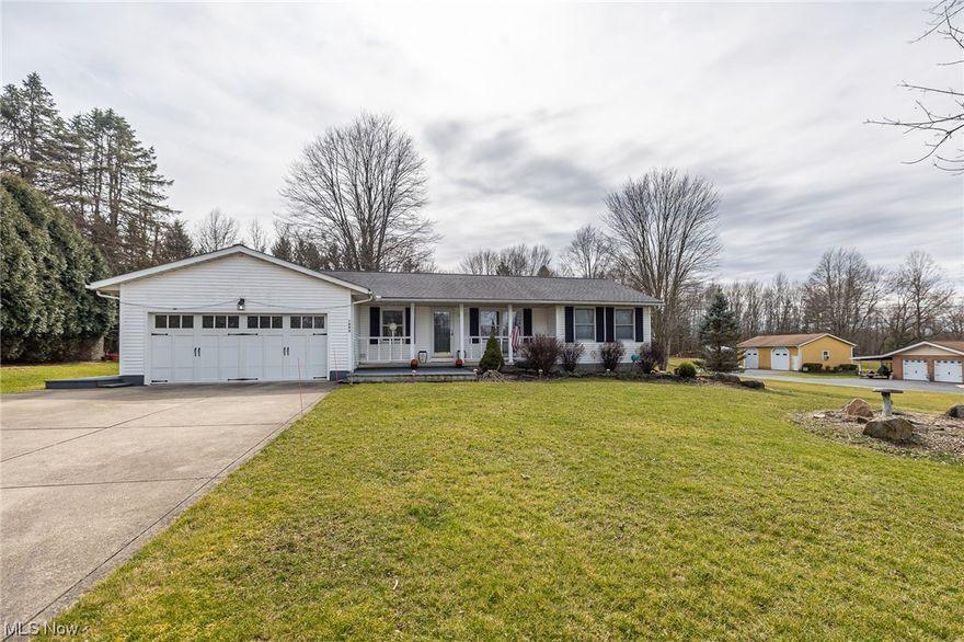 Welcome home to this charming Ranch nestled on over 1 beautiful acre in Sagamore Hills. The entry opens to a spaciously lit & open floor plan, perfect for entertaining. The kitchen features a large island with a breakfast bar, ample cabinetry, prep space and included appliances which opens to the dining area/living room. Down the hall you'll find the master bedroom with a walk in closet, en-suite private bath and access to the backyard. Both the Master & Bedroom 2 lead to the gorgeous backyard. The 3rd bedroom shares a guest bath. 1st floor laundry and attached two car heated garage w/ Nature Stone complete the one floor living at its best. The partially finished lower level offers a spacious family room and a 1/2 bath. In summer, you'll love relaxing on your covered patio watching TV, or taking in the sounds of nature and enjoying the views of your pond (with aerator) & wooded backyard. This home has plenty of opportunities for you and is looking for it's next owner to appreciate all