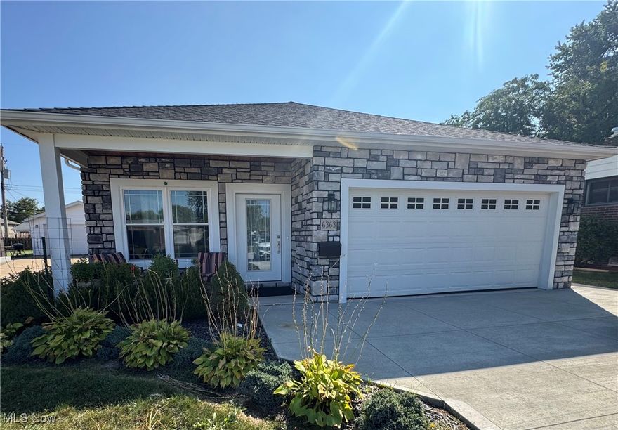 Welcome to this exquisite newer ranch home located in the heart of Brook Park, where modern living meets comfort and style. This beautiful property comes with a remarkable six-year tax abatement, making it an exceptional investment for any homeowner. As you approach, you’ll be greeted by a charming covered front porch that exudes a cozy and inviting atmosphere. The home features a two-car attached garage with a wider concrete driveway, offering ample space for parking and easy access. The front facade is adorned with custom stonework, adding a touch of elegance and curb appeal. Step inside to discover a stunning open-concept layout, highlighted by a beautiful kitchen that is a chef's delight. The kitchen boasts crisp white cabinetry, luxurious quartz countertops, and stainless steel appliances, providing both functionality and style. Natural light pours in, illuminating the newer flooring that flows throughout the home in neutral decor, creating a warm and welcoming ambiance. With ample counter space and a large coffee bar, this kitchen is perfect for both everyday meals and entertaining guests. The spacious family room and dining area are designed for comfort and gatherings, ensuring that you have plenty of space to relax and enjoy quality time with loved ones. The master bedroom is a true retreat, featuring a tasteful tray ceiling with elegant rope lighting that adds a sophisticated touch. The en suite bathroom is a spa-like haven, showcasing a beautiful custom shower that enhances your daily routine. Additional features include a tankless water heater, ensuring you’ll never run out of hot water. Step outside to the backyard, where you’ll find a covered patio that offers a private oasis for outdoor entertaining or quiet relaxation amidst the beautiful landscaping. This stunning ranch home is a perfect blend of modern amenities and cozy charm. Don’t miss the opportunity to make it yours—call today for a private tour!