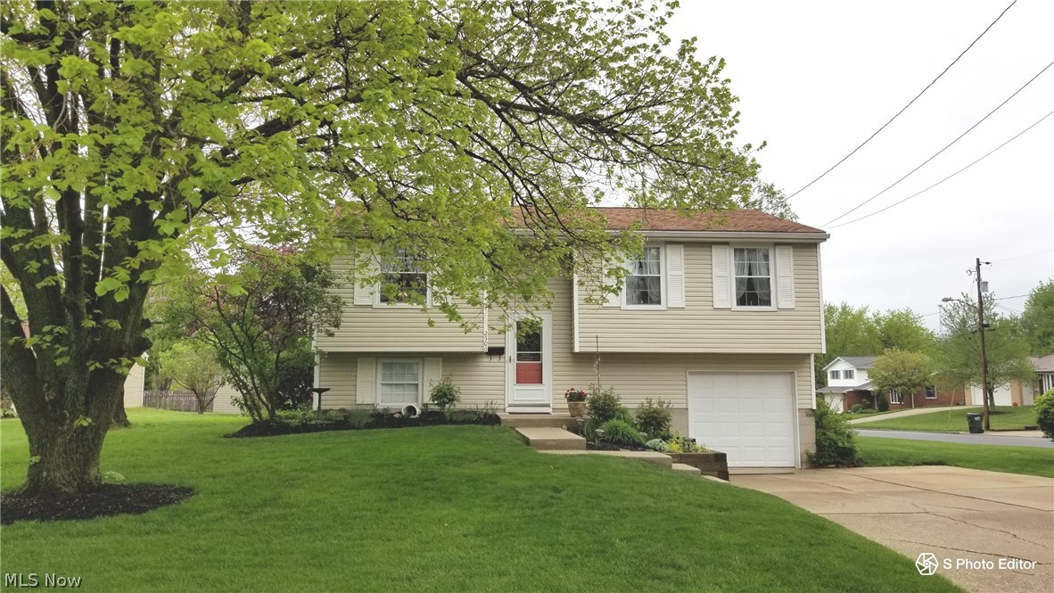 This beautiful bi-level home has been loved and cared for by one owner since 1971 when it was built. Several updates have taken place throughout the years to keep this home meticulously maintained and current. You'll love the natural light that shines into the family room and appreciate the gas fireplace on those cold winter nights. Kitchen appliances convey with the property. There are 3 bedrooms located on the main floor (one is currently being used as an office). The lower level offers a rec-room and additional sitting room or office. Walkout into the garage from the lower level. New Air Conditioner 2021, Roof 2011, Furnace 2012, stamped concrete patio 2015, and new gutters and downspouts w/ leaf guards. The level corner lot is .31 of an acre and boasts gorgeous blooming trees and perennials. Lawn fertilization is paid through the end of this year. Also included with this amazing property are 2 sheds (12X8 and 10X8). Fantastic property, you're going to love it! Homestead Reduction h