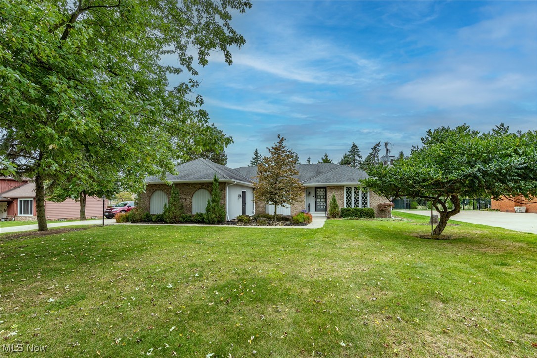 Welcome to St.Thomas Woods in North Royalton Ohio. This lovely 3 bedroom 2.5 bath home offers many features and benefits, The home offers an open floorplan with large family room with woodburning fireplace. Open to the updated cooks kitchen that is bright and airy. Custom Kraftmaid cabinets with ceramic tile backsplash and gas stove with rangehood, There is a lazy susan and tons of cabinets with pull out drawers for easy access. A formal dining room with bay window is ideal for entertaining! The first floor laundry room has a laundry tray and newer washer and dryer. The large garage has a wheelchair lift for access to the home. The main bath offers a large custom shower with multiple shower heads and built in shower seat with upgraded ceramic tile walls. The primary bedroom has a large closet a vanity area and bath with dual sinks, shower and toilet with grab bars. There is a basement that offers endless possibilities for customization, and an additional laundry hook up. The back yard has a stunning stamped concrete patio with covered area for additional outdoor living. Close to shopping, restaurants, library and parks. Call today to see this amazing home with all the incredible features!!