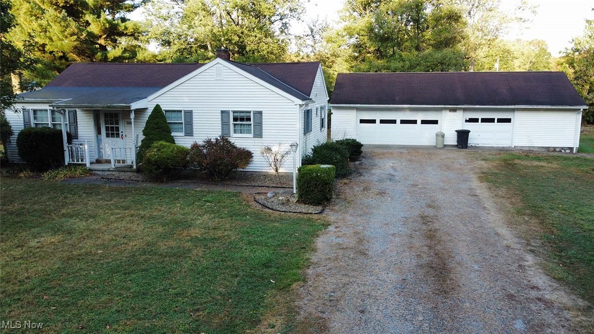 Take a look at this three-bedroom ranch home with two great outbuildings on .64 acres in West Branch Local Schools!
Home features an updated eat-in kitchen with abundant cabinets, countertop space, and appliances. Large
living/dining area with built-in cabinets and a desk area. Three bedrooms with hardwood floors, laundry, and a full
bath on the main level. Nice 20x14 rear addition living area with fireplace and sliding door to patio. Outside is a 44x23
finished insulated garage with gas heat and two overhead doors. Also, a 28x40 pole barn with concrete floors, overhead
door, and electric! The home has gas forced air heat, and public water with septic. Schedule a showing today!