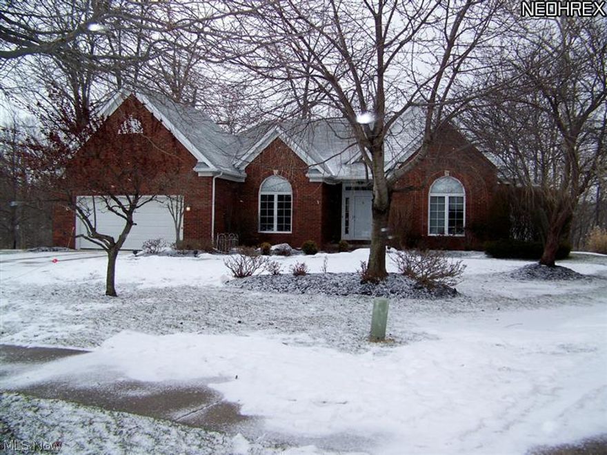 Great location! This 3 bedroom, 2.5 bath Ranch is wonderful! Situated on a cul-de-sac surrounded by nature! High above flowing creek and marsh, come watch the deer play from the eat-in kitchen or 3-season room! Huge kitchen with oak cabinets, island with breakfast bar and gazebo style breakfast area! Volume ceilings thru-out. Master suite with beautiful bath with jet tub, separate shower and double sinks. Make yourself at home in the great room with vaulted ceiling, brick fireplace and a wall of windows overlooking private back yard. Beautifully manicured yard with sprinkler system.