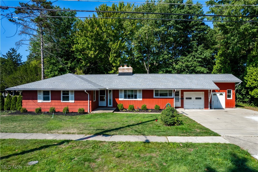 They say in real estate, it's all about location—and it doesn't get any better than this incredible ranch-style home on Coe Lake in Berea! Nestled on a private inlet of Coe Lake, this family home, never before listed, is sure to impress with its stunning setting and storybook views. As you enter through the front door, you'll be captivated by the massive living room featuring hardwood flooring, updated ceiling fans, a custom fireplace, and a wall of windows that showcase breathtaking views of Coe Lake. Open to the spacious dining room, this area is perfect for entertaining guests or hosting memorable family gatherings. An enclosed porch off the dining area offers the ideal spot for enjoying your morning coffee or unwinding after a long day while taking in the tranquil lake views. The kitchen provides ample space and is ready for your personal touch—let your imagination run wild to make it the culinary heart of the home. The first floor also includes two bedrooms, a hall bath, and a true master suite complete with generous closet space and a private full bath, offering a peaceful retreat. Downstairs, the fully finished basement has been totally remodeled and serves as an additional living space with two bonus rooms and a full bathroom, providing endless possibilities for use as guest quarters, a home office, or a recreational area. Adjacent to the garage, you'll find an impressive workshop, perfect for hobbies, projects, or extra storage. This home offers a rare opportunity to enjoy lakeside living with modern comforts and an unbeatable location. All of this and walking distance from downtown Berea to enjoy shopping, restaurants, parks, pools, concerts, fireworks, festivals and more! 2020 ROOF & GUTTERS. 2013 WINDOWS. 2020 BASEMENT WATERPROOFED W/TRANFERABLE WARRANTY & 2020 BASEMENT REMODEL. Don't miss your chance to own this unique gem on Coe Lake. Schedule your private showing today and experience the unmatched beauty and charm of this one-of-a-kind property!
