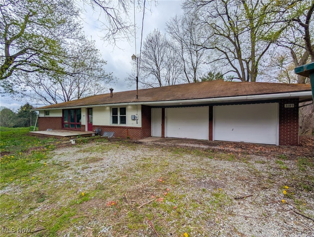 Great opportunity is waiting in this ALL BRICK 5 bedroom, 2 bathroom RANCH sitting on a picturesque 1 acre lot in Minerva Schools. This home is perfect for multi generational living or the owner lives on one level and rents out the 2nd level. 2 entrances, walkout finished basement with full kitchen, full bathroom, 2 bedrooms and full living room with gorgeous fireplace. Needs updating but is very livable with minor paint and flooring. 3 bedrooms, 1 bathroom, living, dining kitchen upstairs. Mineral Rights Convey. New septic being installed July 2025.