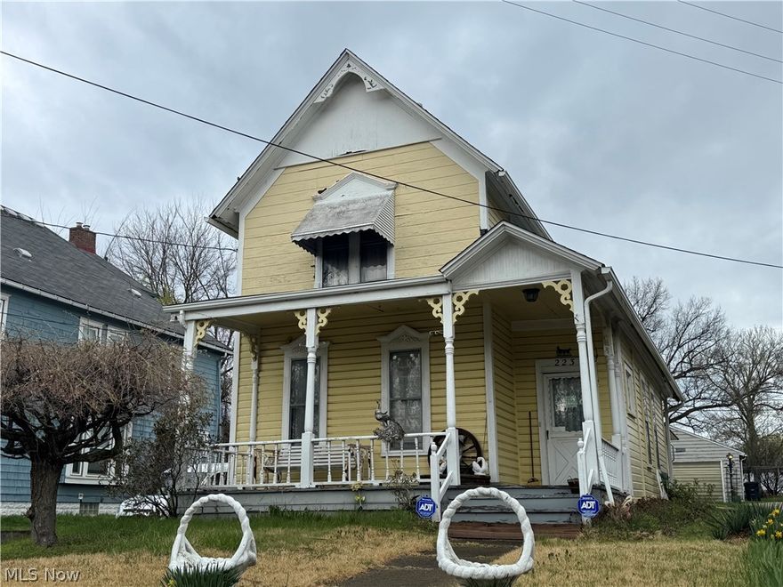 This property is located in the West Hill Victorian Village with zoning (UPD40) that  allows for multiple uses. Office, daycare, retail? All allowed. The living room is at the front and has a nice decorative fireplace. This room is open to the first floor bedroom and presently only closed off by draperies. There's a walk-through closet between the first floor bedroom and bathroom. The front door enters directly into the dining room. The kitchen sink base was updated and the original pantry is still present. The two car detached garage is at the rear of the property. There is very little land with this house and the only off-street parking would be in the garage.