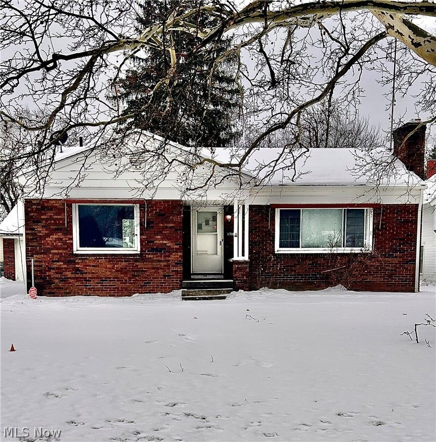 Mid-Century Potential in a Classic Brick Ranch
Classic character meets untapped potential! Nestled in a quiet, established neighborhood, this 1952 solid brick ranch is the perfect canvas for a savvy homeowner or investor looking to build sweat equity. With its "good bones" and timeless silhouette, this home is ready for its next chapter.

Interior & Layout:
Solid Construction: Durable 1950s brick exterior that offers lasting curb appeal and low maintenance.

Single-Level Living: 3 comfortable bedrooms and 1 full bathroom, perfect for those seeking an easy-access floor plan.

Vintage Charm: Large windows flood the living space with natural light, highlighting the original details waiting to be polished.

Outdoor & Additional Features:
Detached Garage: Keep your vehicle out of the elements or utilize the extra space for a secure workshop and storage.

Covered Back Patio: The perfect spot for morning coffee or rain-or-shine grilling. This shaded retreat overlooks the backyard and is ready for your landscaping touch.

The full basement is the true wildcard of this property. Currently a blank slate, it is "waiting to shine again"—offering a massive footprint for a future family room, home gym, or additional living suite. Bring your vision and unlock double the living space!

Note to Buyers: This home is being sold as-is. It needs a little TLC (paint, flooring, and modern updates) but offers a rare opportunity to own a detached brick home with a garage at an accessible price point.