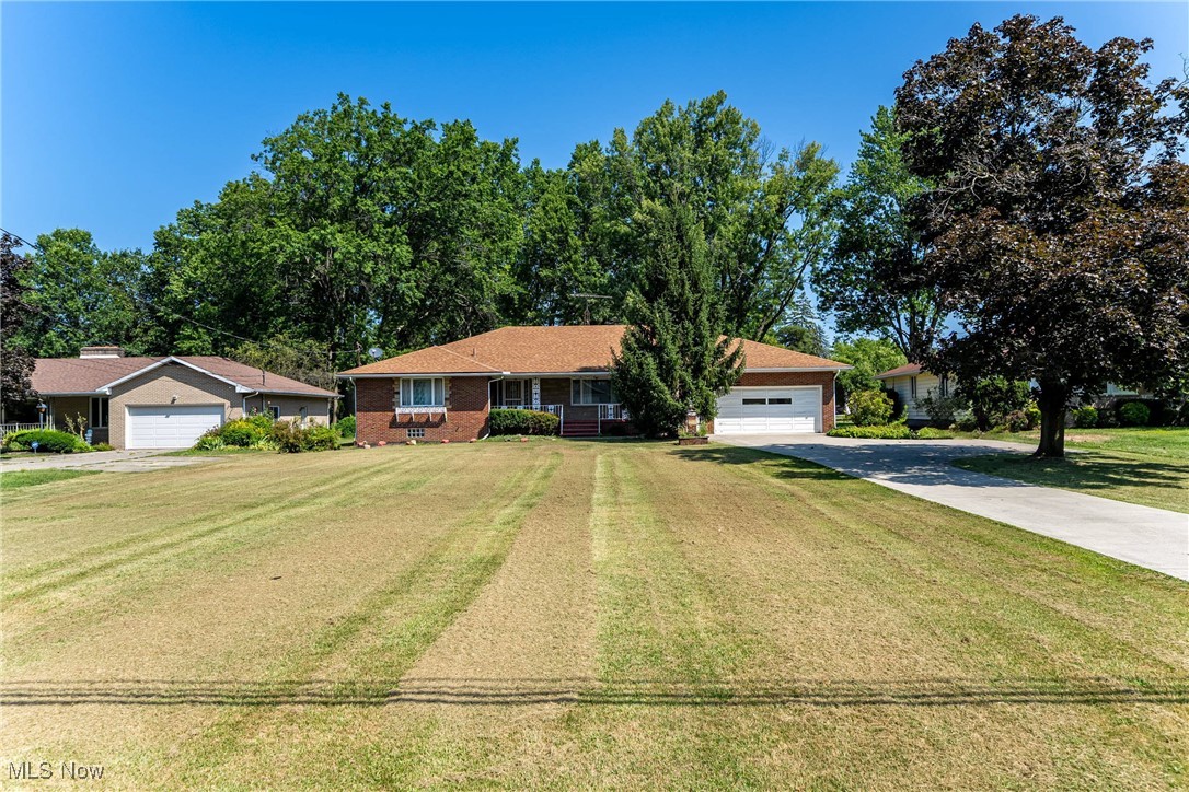 Welcome to this nearly 2,000 sq ft, 3-bedroom brick ranch that offers comfort, space, and an ideal layout just waiting for your personal touch. Situated on a little over half an acre, this home features a private backyard perfect for relaxing, entertaining, or enjoying nature.
Inside, you'll find a generous main floor layout with a large living area, a master bedroom complete with its own private half bath, and the convenience of main-floor laundry. The home also boasts 1 full bathroom and an additional half bath to serve family and guests. The spacious covered front porch invites you to sit and unwind, while the back patio provides the perfect spot for outdoor gatherings.
The 2.5-car garage offers not only ample room for vehicles and storage but also extra space in the back with its own garage door that opens directly to the backyard - ideal for lawn equipment, hobbies, or easy access for outdoor entertaining.
With its great bones and well-thought-out design, this home offers incredible potential for updates to make it truly shine. Don't miss the opportunity to own a property with this much space, charm, and possibility!