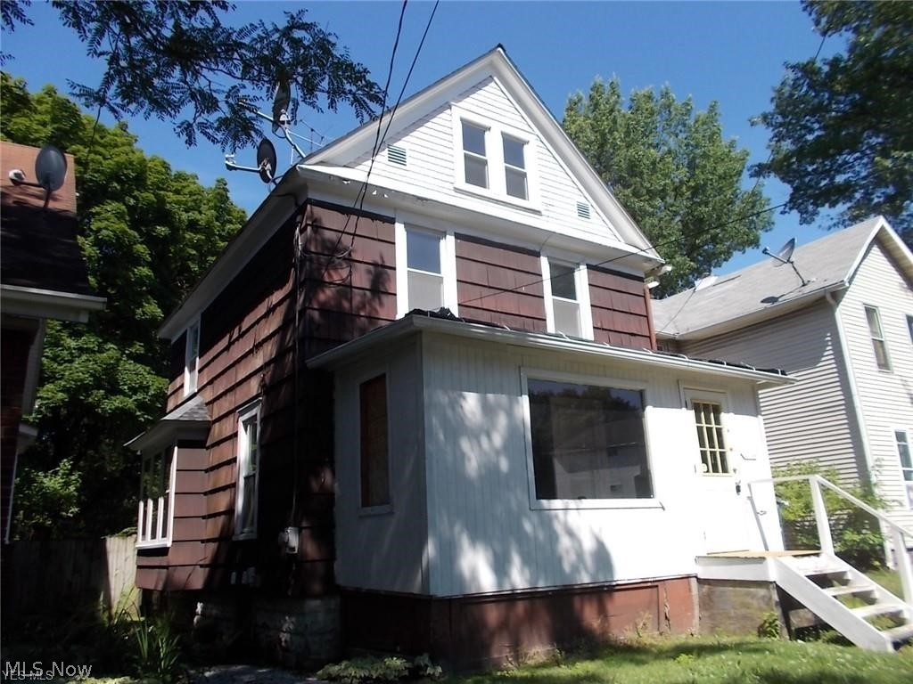 Welcome to 690 Kling..a spacious Colonial just off University of Akron campus!! Property features carport and storage shed and also enjoys an enclosed front porch as well as a great covered back deck!! The spacious kitchen offers plenty of counter space and storage. This home has larger rooms and some great built ins and classic features. The top floor could be sizeable fourth bedroom or great recreation space! Windows have been updated. Property offers amazing potential and could be the perfect first family home or great University investment property. Close to all the downtown and campus areas has to offer! Property needs work and furnace will need replaced but potential is truly there at the price! Don't miss your chance at this one..call for a private showing today!!