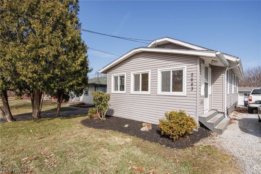 WOW!  Check out this wonderfully updated ranch in the charming May Forest allotment in Akron Ellet!  This 2 bed, 1.5 bath comes completely updated in addition to the windows, roof, furnace, hot water tank, AND ac all being only 4 years old!  Talk about efficient living!  First, you'll walk in and find a gorgeous 4-season room with beautifully finished hardwood floors; perfect for your morning cup of coffee!  You'll then find yourself entering a spacious, open main level, starting with the living room.  You'll find ample space in the living room for entertaining and family enjoyment!  Next you'll see yourself in the kitchen with an attached dining area, perfect for conversing while cooking up something delicious!  Across from the main living area, you will find your two bedrooms, both equipped with more of those gorgeous hardwood floors, with a nicely updated full bathroom positioned conveniently between the rooms!  In the lower level you will find the laundry as well as another half ba