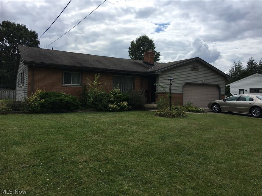 3 Bedroom, Brick ranch with 2-1/2 baths, full unfinished basement, small sun porch off dining room, two car attached garage.  Hardwood floors throughout.