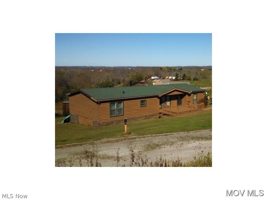 Three bedroom, 2 bath mobile home that has been converted to real estate. 1478 sq. foot on a block & pier foundation. Beautiful country views from over sized back deck! New hot water heater & new roof in 2012. Situated on a little over an acre. Priced at $69,000. M742 AY Elem: Salem-Liberty Elementary Schoo Elem/Bus: Y JrHigh: Fort Frye JrHigh/Bus: Y High: Fort Frye High School High/Bus: Y Fire: VOL Police: SHF PossFreeGas: N ;SQFT=Fin L1:1482, Fin Bsmt:0, Fin Above:1482, Fin Total:1482, Unfin Above:0;PRKG= Off Street