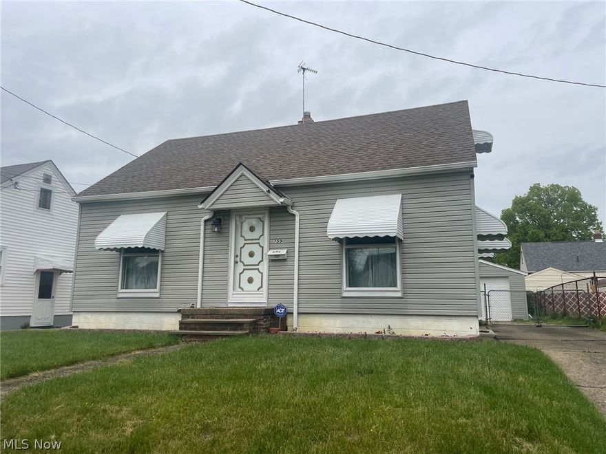 Welcome to this wonderful updated cape cod in Firestone Park. Hardwood floors throughout most of the first floor and 2nd story.  Spacious kitchen offers gas range w/newer hood and eating area.  Bright living room w/front closet. Two bedrooms and main full bath w/tile surround complete the first floor.  Large bonus bedroom with ample closet space on second floor.  The lower level features a fabulous finished recreation room, laundry area, and storage room/exercise room.  1 car garage.  Gate fence at driveway.  Privacy fence.  Notable improvements include newer glass block windows, security system, newer electric, garage door w/opener, and more.  Move-in ready.