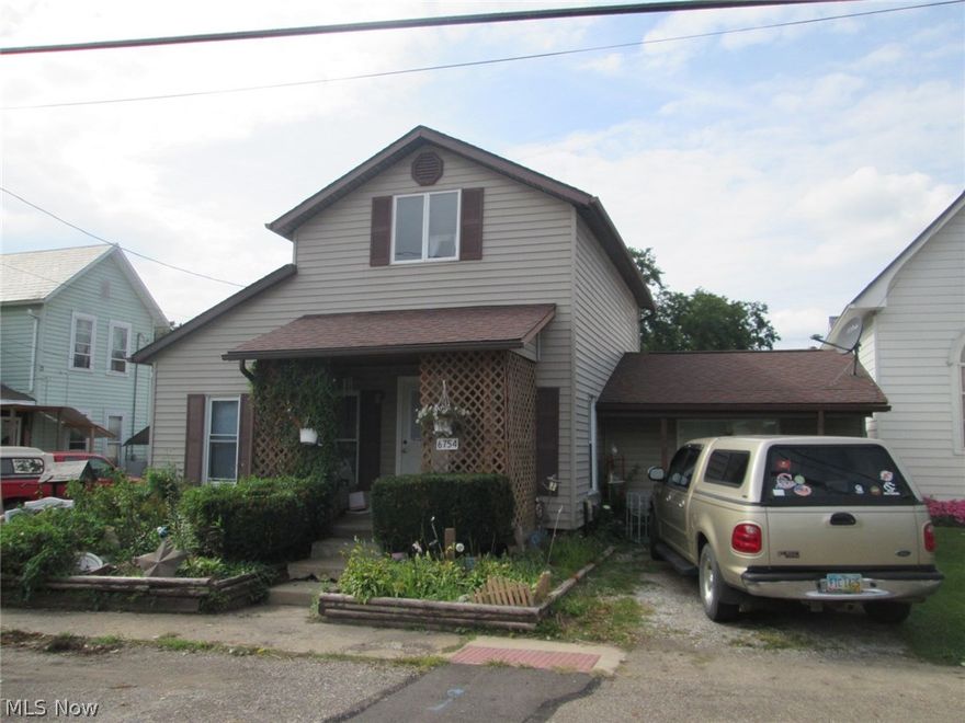 This home has everything you are looking for - Large inviting living room, eat-in kitchen with plenty of counter/cupboard space and a bonus 15 x 20 family room.  First floor bedroom, bath and laundry.  2 HUGE bedrooms upstairs.  Nice flat, private backyard with brick patio (excludes storage sheds).  BONUS - 32 x 36 insulated, heated, over-sized workshop with electric...PLUS a separate finished living space...it even has a kitchen!  This building is everyone's dream!  Perfect for anything/everything - family reunions, graduation parties, holidays, man cave, craft room....or a potential rental?  The home is great and this space is FANTASTIC - come check it out!  Roof, furnace updated approximately 6 years ago.