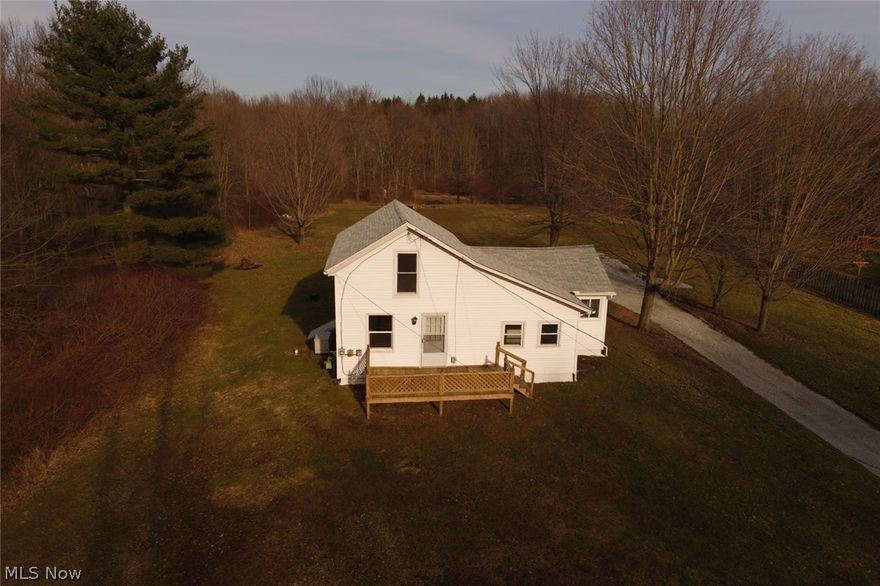 Welcome home! Updated kitchen and baths with new flooring. New carpeting in bedrooms. New roof and vinyl siding in 2018. Large private wooded lot sitting on 2.5 acres with a two car garage. Convenient first floor laundry. Large sun room/mudroom. Whole home generator and all new stainless steel appliances.