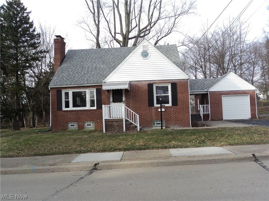 Great brick cape home with 2/3 possible bedrooms, 2 baths, large fully appliance eat-in kitchen, some wood floors, some laminate, some newer carpeting, living room with woodburning fireplace. Waterproofed basement has rec room area with fireplace that is not guaranteed & 2 additional rooms. Newer hot water tank, glass block windows, fenced yard, 1 car garage w/opener. Home Warranty offered.