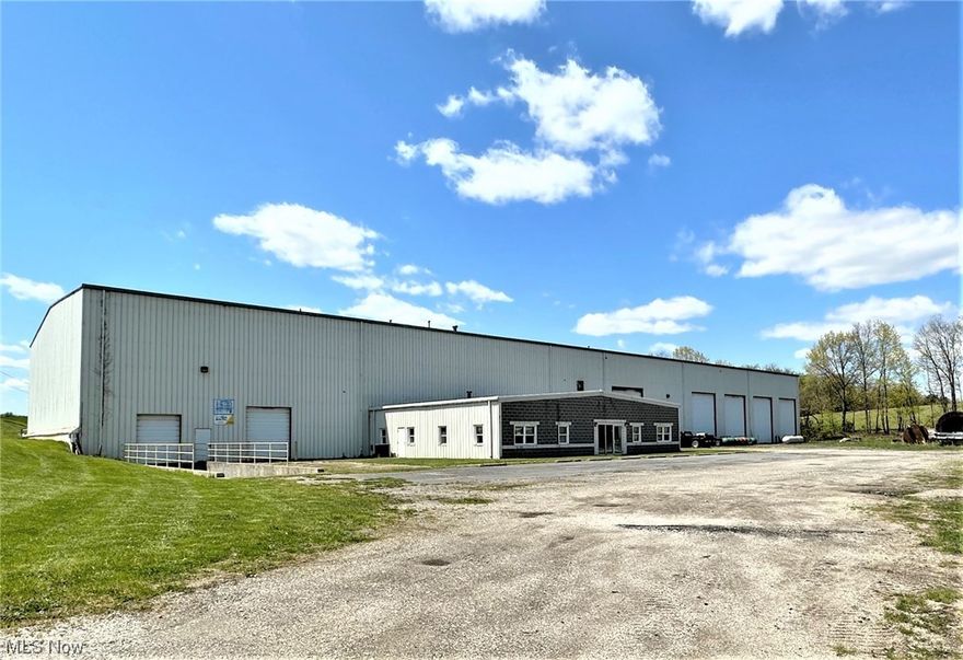 RARE FIND IN CARROLLTON! 33,000 sq. ft. commercial building built in 1996, situated on 7.772 acres on Industrial Drive in Carrollton. Zoned 340 manufacturing and assembly and 400 commercial vacant land. 3,000 sq. ft. of office spaces, 30,000 sq. ft. of manufacturing space. Includes, furnace room, utility room, locker room, bathroom with shower, and some overhead storage area. 7 overhead garage doors, 2 loading docks, and 2 storage sheds. Call Listing agent for more details.