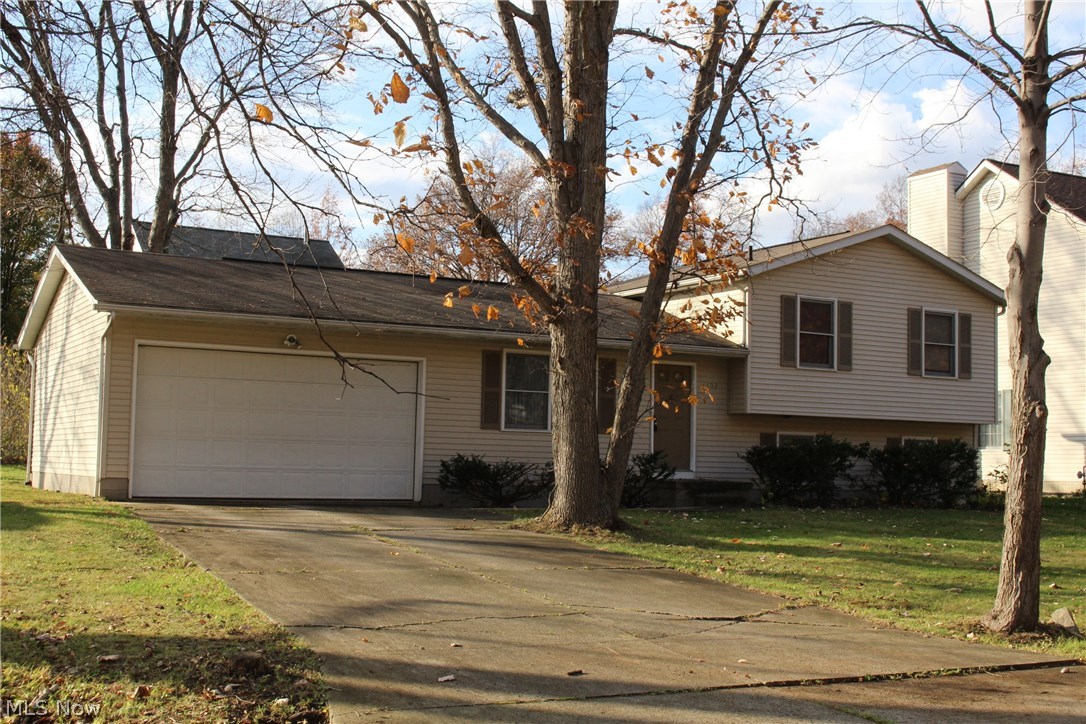 Dare to compare? Newer solid built home in Stow, OH, 4 bedrooms and 2 full baths, oversized 2 car garage, granite kitchen countertop, wood and carpet flooring, some brand new windows and sliding door. Newer range, exhaust fan and hot water tank Great design with 3 bedrooms and 1 bath on one level and 1 bedroom with 1 bath on another. Basement waterproofed with transferable warranty. Located in a quite beautiful neighborhood yet close to major roads and schools, stores… Good home great location, at this price, you will never find anything better….