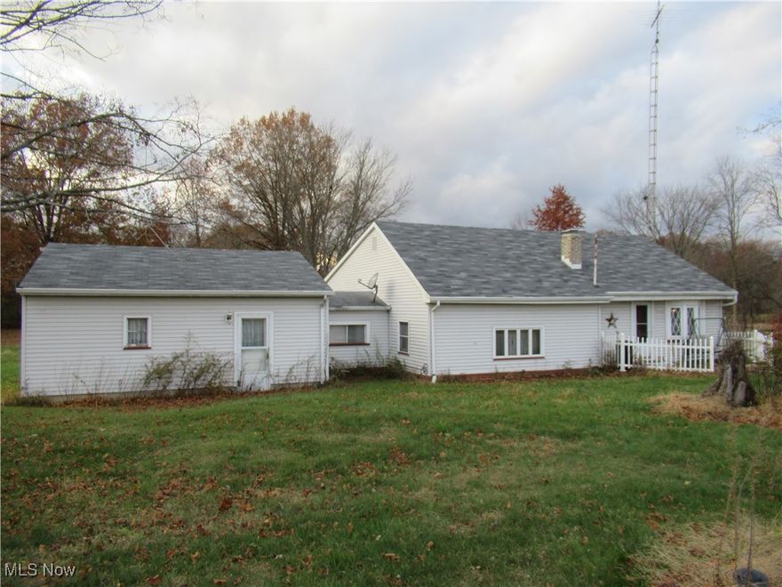Discover the potential in this spacious 3-bedroom, 1 bath home situated on a full acre just 3 miles south of Damascus in the desirable West Branch School District.  this property features a bright living room, large family room, and an eat-in kitchen perfect for gatherings, along with a relaxing sunporch overlooking the backyard.  The 2+ car heated garage, connected by a convenient breezeway, provides ample workspace and storage.  Updates include a new well (2016 .), and hot water tank (2017). A wonderful opportunity to add your personal touch and make this home your own!