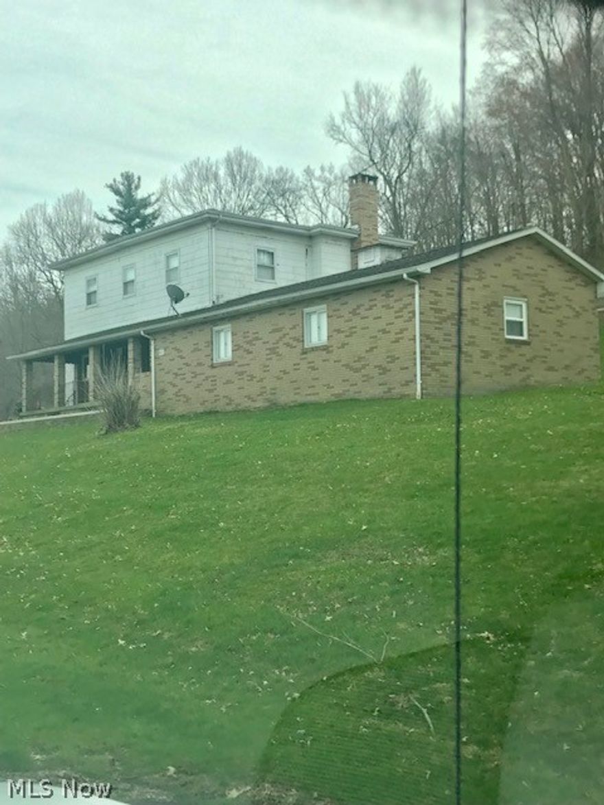 Great opportunity to live in a beautiful country setting with privacy on  1.5 acres.   This  2 story country farmhouse has a full basement, 3 car attached garage, large kitchen and a beautiful stone fireplace.    Don't let this pass you by, call today for your private showing.   New survey completed  3/2019.  All mineral right owned by seller transfer to buyer.