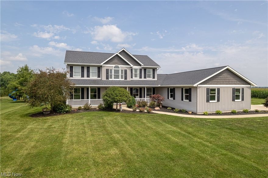 Where luxury & custom, meet peaceful country oasis!! Exquisitely manicured 5 bedroom, 3.5 bath colonial estate STUNS! Sprawling 7 acres include: an in-ground fiberglass saltwater heated pool, pool house, huge entertaining spaces, 2car detached garage, open pasture space, & a thick wooded portion tucked far back. Every inch of living space has been beautifully curated, including the two-story sun-soaked foyer! The chic, classic kitchen was renovated with quality & beauty in mind. Custom white cabinetry, granite countertops, modern, sleek hardware, second island with bar seating & additional storage. Kitchen-Aid appliances in matching cabinet facing will stay. New Cooktop (2022), Bosch dishwasher (2021). Bev fridge. Gorgeous laundry room features stylish ceramic flooring, abundant storage space, bright red farmhouse sink, and granite countertops! First floor master suite will leave you speechless!! Spacious bedroom with custom master bath! Bathroom features a huge soaker tub, beautiful tile shower, custom double granite vanity, walk-in closet (plumbed with sink & for additional W/D hookup) and SHOE CLOSET (both Closet By Design). Sweeping family room offers tons of room for everyone to relax. 4 large bedrooms & updated bathroom found on the second story. Finished Basement with full bath, granite wet bar & TONS of storage! Paved driveway. RV Pad. 3 car attached garage- electric+heat. New heat pump furnace, siding, roof & laundry room added (2020). Much more!!