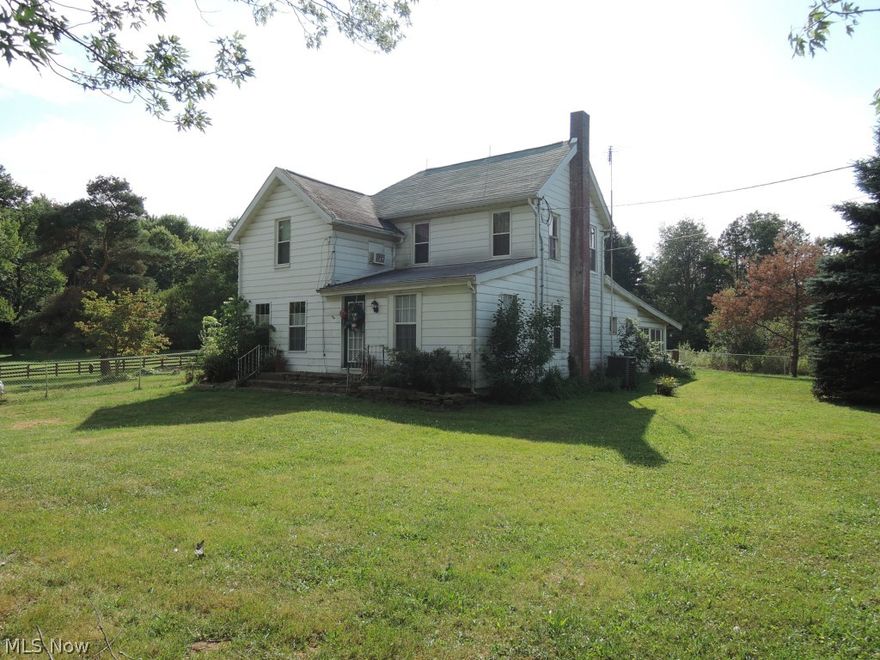 Appreciate century old homes? This one is for you. Some updates have been done or are in progress. Electric service and plumbing updated, remaining work is mostly painting, trim and floors. Large enclosed patio, five car garage, workshop, and shed. New roof on patio and garage, new septic 2007.