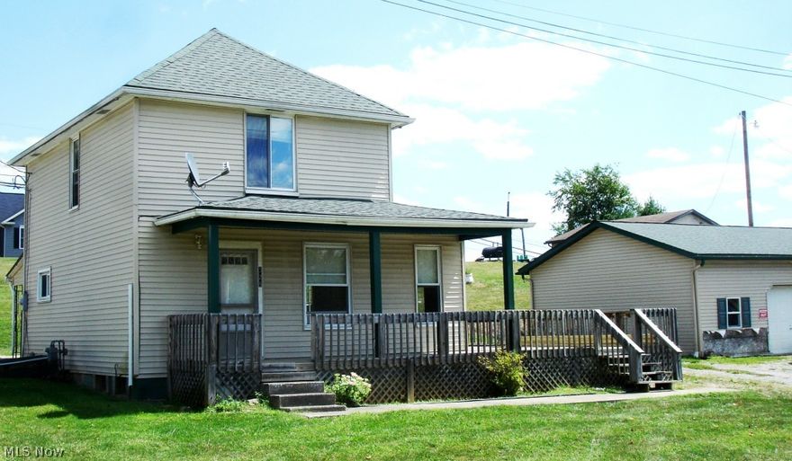 Garage new 2007. MWCD assessment $6 per year. Varnished solid pine walls and ceilings in most of the home. Huge garage. Public Water and Public Sewer. Newer thermo-pane windows and French Door to large deck. Available for possession at closing.