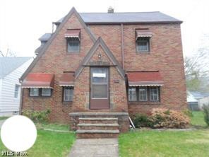 Sharp brick sided tudor style colonial just steps away from Coronado (private) beach! Oversized detached one car garage with built-in work area. Character filled interior with both natural and painted wood work. Deco fireplace in the living room and built-in cabinets in the dining room. Modern half bath on the first floor makes entertaining that much easier. Fresh paint and carpet thru-out make this home ready to go! Good size bedrooms. Clean, dry basement with newer furnace. Updated electrical panel. All of this for under 100k....hurry!!