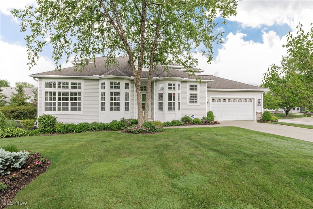 Welcome to one of only 9 free standing condominiums in demand Villas of Orange. This is a meticulously maintained home. Features include a great room (with fireplace and built-ins) that walks out to the private back patio area. The owners' suite is on the first floor with two walk-in closets. The owners' bath has a jetted tub, double sinks and a vanity area. The kitchen has a newer dishwasher and refrigerator, and all stainless steel appliances. The clothes washer and dryer are also newer. The first floor is freshly painted and has newer window treatments. The den has a built-in desk area, and many other built-ins. The second floor has two large bedrooms plus a loft (currently used as a music room). There is a large, unfinished lower level....a blank canvas to do whatever you want from a hobby room to an exercise room. Don't miss this gem.