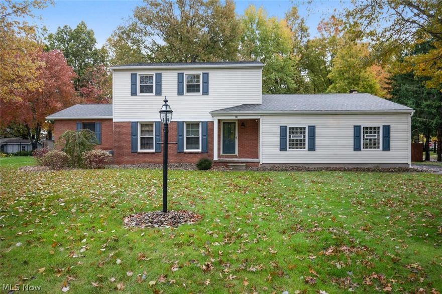 Super updated 4 bedroom brick & vinyl 2 story boasting almost 2600 Sq.Ft. This property is located within walking distance to the Canfield High School and across the street from the swim club. This home also features a first floor master suite with 2 closets one being a large walk in and a huge master bath all ceramic tile and remodeled in 2014 and has a slider out to the deck. This home also includes a living room w/ wood floor, formal dining room w/ wood floor huge kitchen with new life proof flooring and stainless microwave, gas range and dishwasher. The family room has a new bamboo wood floor and wood burning fireplace plus a slider out to the deck. There is a huge mud room/ 1st floor laundry room all ceramic tile with french door out to the deck. Recent updates within the last 3 years include roof shingles, gutters and downspouts, High efficiency furnace and air, painted white trim, exterior lights, tile and flooring in rooms and interior paint. The exterior has a new wood privacy