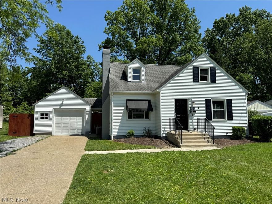 Four bedroom, two full bath, Cape Cod.  This home has been updated with new carpet, ceramic flooring in baths and kitchen. First floor features large living room with fireplace (gas logs), original hardwood floor.  Two bedrooms with original hardwood flooring.  Updated bath and kitchen with new granite counter top , new counter top range and new built in oven.  Second floor has two more large bedrooms, new carpet and updated bath.  Full basement can be converted to additional space.  1 car detached garage and large fenced in yard.