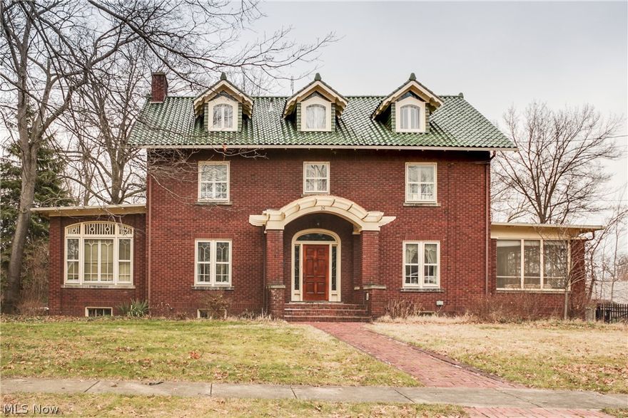 This Stunning all brick Progressive Mode style Home was designed by Harpster & Bliss. It was pictured in the book, "Art Houses of Akron". The home boasts 6 bedrooms, a Family Room, Solarium, Dining Room, Kitchen and Living Room. The basement is a full foundation, even under the Solarium. Located in a Historic area of Akron, it is close to Our Lady of the Elms, shopping, and other amenities. This one of a kind home is a historic, architectural, piece of art.