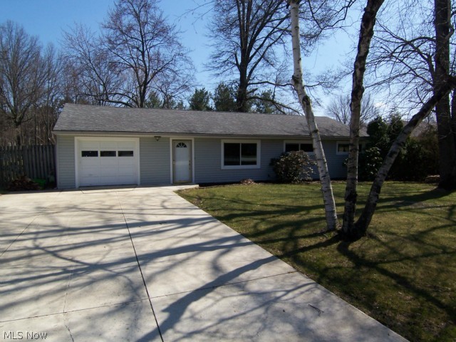 A wonderful opportunity in Stow on .442 acres. This 4 bedroom, 2 full bath ranch is updated with features galore. The many updates include: roof, siding ('13), windows ('13), kitchen ('13), appliances ('13), baths, flooring, paint, and much more. The kitchen features granite counter tops, stainless steel appliances, newer cabinets, and ceramic floors. The spacious family room has a pellet stove, and ceramic floors with marble inlets. The thresholds are granite! There is a master suite with walk in closet and fireplace. The large rear yard is completely privacy fenced. There is first floor laundry, an attached garage, newer concrete driveway, and so much more.