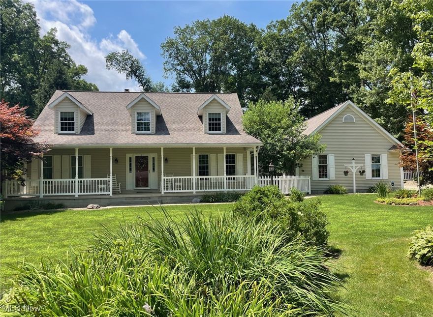 Welcome to this truly one-of-a-kind custom home nestled on just over 1.5 beautifully landscaped acres in the highly sought-after Triway School District. Thoughtfully designed and carefully crafted, this home offers premium finishes and incredible comfort throughout. From the moment you step inside, you'll appreciate the exceptional quality and detail—starting with the reclaimed long leaf pine floors that run through much of the main level. The spacious, updated kitchen features custom birch cabinetry from Shrock, quartz countertops, and a large walk-in pantry just off the kitchen. The main floor offers multiple inviting living spaces including a cozy living room with a gas fireplace and a newer, expansive family room—also with a gas fireplace—perfect for entertaining or relaxing evenings at home. The first-floor primary suite includes a private bath with double vanity, tub, and separate shower. Additional main floor amenities include a formal dining room, oversized laundry room with utility sink, and a convenient half bath. Upstairs, you'll find two generously sized bedrooms—each with dual closets and a built-in putting cup for a fun touch—as well as a Jack & Jill bathroom for added convenience. The full basement is foam insulated and features built-in shelving, making it ideal for storage, a recreation area, or future finished space. Peace of mind comes easy with a sump pump and battery backup, plus a whole-house backup generator. A standout bonus is the attached ±750 sq ft workshop, formerly a wood shop, perfect for hobbyists, DIYers, or extra storage. Outside, enjoy mature trees, scenic views, and shady spots throughout the yard, along with a concrete driveway and a 16' x 12' high-quality storage shed with 14' x 4' lean-to for your lawn and garden equipment. This is a rare opportunity to own a home where no detail has been overlooked. Come experience the charm, craftsmanship, and meticulously maintained home for yourself—schedule your private tour today!