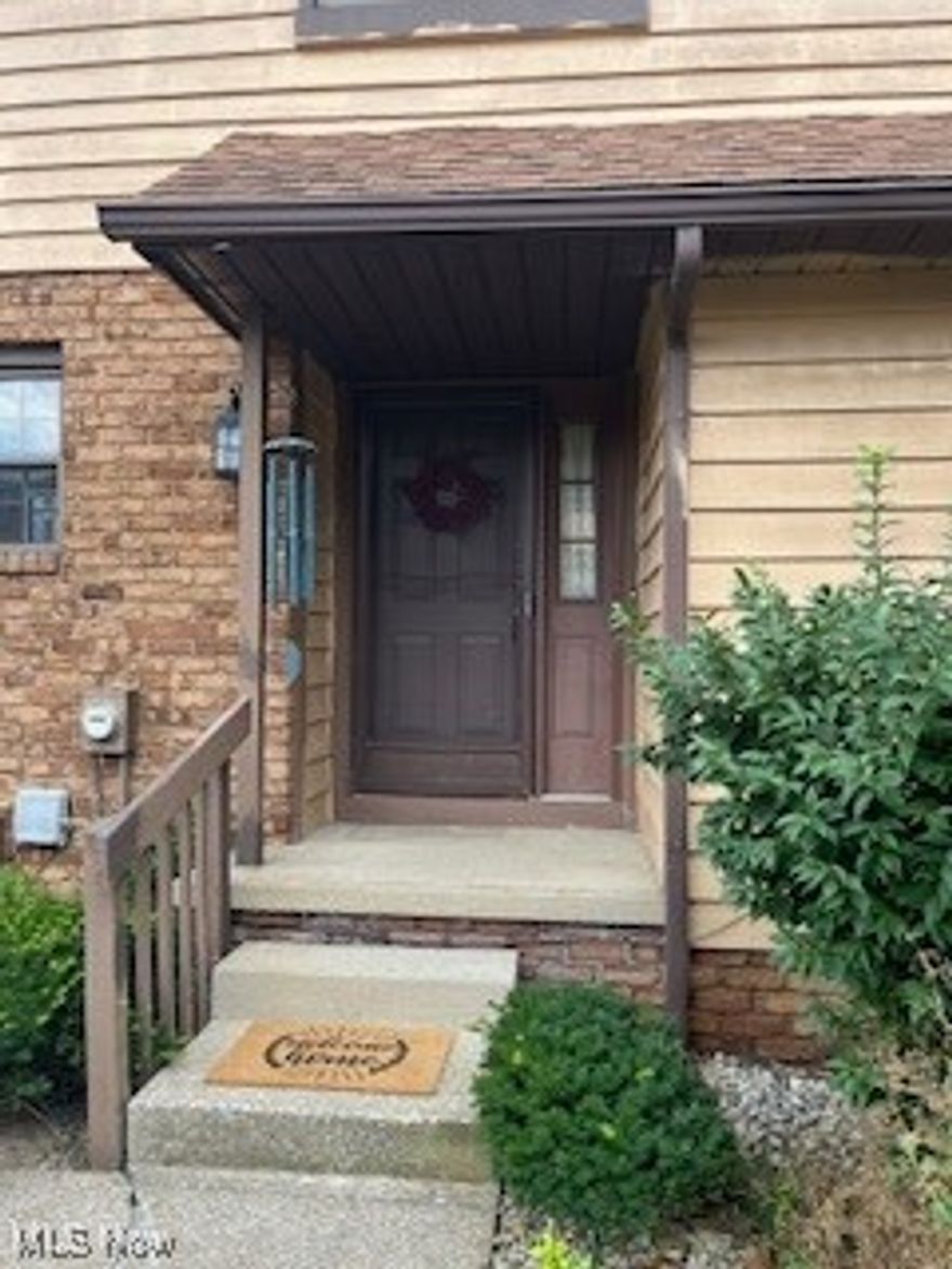 Live near nature and Fun! Riverfront contemporary style condo at Ledgewater Falls. You can walk right over to the Riverfront District for dining, attractions and shopping! This location also offers easy access to Route 8.You enter into an open foyer with newer tiled flooring, a half bath and laundry room. The kitchen has been updated with countertops, breakfast bar, newer LVP flooring and all Stainless Steel appliances convey to the buyer. There is a good sized pantry off the kitchen. The living room is spacious and has newer neutral luxury vinyl plank flooring, gas fireplace with glass tile and hearth, an eat in dining  area, a large deck through slider doors that overlook a wooded lot and the river. A/C unit replaced 2024.
Upstairs you will find 2 big bedrooms. The primary bedroom has vaulted ceilings, a walk in closet, attached master bath. The master bath has tub/shower combo, skylight, and a private dressing area with built in vanity! The second bedroom also has a walk in closet. Moving to the lower level, you'll have a finished recreation room ( or third bedroom) with views of the river, a half bath, large storage area room with shelving and extra storage under the stairs. This condo development has only 18 units total. There is a one car garage with entrance just steps away, and a designated parking space for the unit and guest parking is available on the hill. This is a serene, peaceful, beautiful, yet vibrant place to live! It is a very unique place in the heart of Cuyahoga Falls!  Make sure to book your showing with your agent!