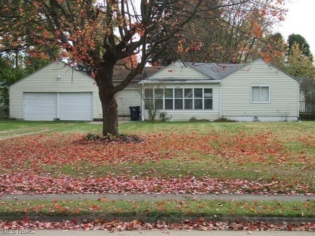 Cute 2-bedroom Ranch on almost 1/4 acre/2 parcels. The enclosed front porch leads to large living room, then dining room with french doors to side deck and small fenced area. The fully applianced kitchen with oak cabinets leads to small enclosed back porch/mud room, patio and backyard. Two bedrooms, one with two double closets and large, full bathroom with handicap bars in shower complete the first floor. The basement has wet bar, half bathroom, and laundry area with utility sink. Detached 2-car garage has gas heater. Updates include roof 2008, H2O 2020. Hardwood floors in living room and dining rooms, not sure about bedrooms. Staying are the kitchen appliances, washer/dryer, freezer and treadmill in basement, and safe in garage (Executrix assumes all work.) A few personal touches could turn this into your own private oasis!! (**Note, two new garage doors are on order and will be installed when received, even if after closing**)