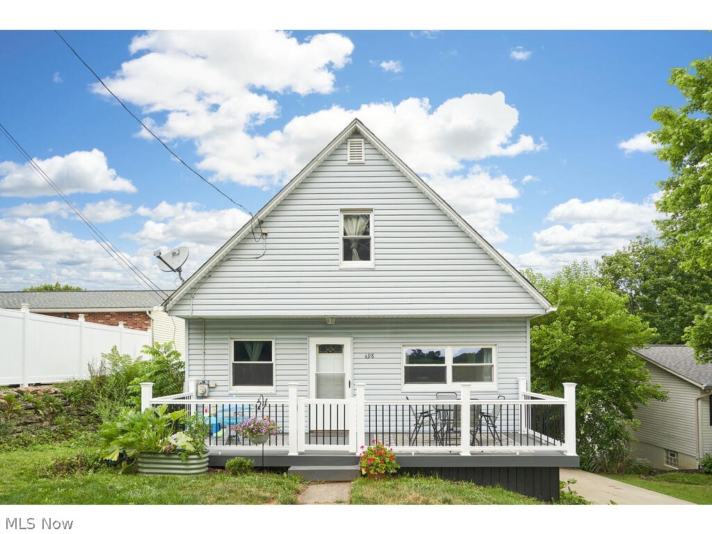 Welcome to this charming Cape Cod in Wadsworth! This home features many updates, including a completely remodeled kitchen (2024). Right away you'll notice the new composite front porch (2023), which is a perfect area for enjoying the warmer months! Enter through the front door to the living room, which connects to the updated eat-in kitchen featuring new flooring, cabinets, subway tile backsplash, granite countertops and a new microwave, range & dishwasher. A bedroom/office w/new flooring and full bathroom complete the first floor. Head upstairs to find two additional bedrooms. The bedroom currently being used as the master features new flooring, his & her closets and a window seat. The lower level is a full walk-out that gleams with natural light. The walls are finished; the only thing needed is flooring to make this an additional 120 sq.ft. of living space! The lower level also has a full bathroom and laundry area. Spacious backyard with shed! Roof, windows, driveway, furnace and A/C are approx. 8-9 years old. Don't miss the opportunity to call this home yours!