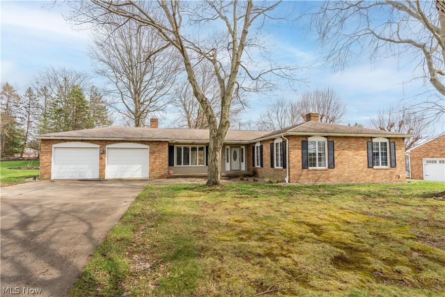 This spacious brick ranch is perfectly situated on a generous 0.48-acre lot, offering an ideal layout for both entertaining and everyday family living. From the moment you arrive, the inviting front porch and walkway set the tone for this 2,413 sq ft home. Inside, the bright and airy great room is filled with natural light from large front windows and features a brick fireplace, along with sliding glass doors that open to the back patio. The kitchen is well-appointed with granite countertops, a tile backsplash, and abundant cabinetry. Just off the kitchen, the cozy family room showcases a grand brick surround wood-burning fireplace and provides direct access to the sunroom. Surrounded by sliding glass doors, the sunroom offers the perfect space to enjoy indoor-outdoor living, complete with views of the pool and easy access to the patio. Step outside to your private backyard retreat, designed for relaxation and entertaining. The outdoor space features a spacious patio, an in-ground pool, and a storage shed, all set within the expansive yard. The main level includes three generously sized bedrooms and two full bathrooms, including a comfortable primary suite with a private ensuite bath featuring a tub/shower combination and ample closet space. The partially finished basement adds even more living space, offering a large recreation room with a wet bar, a bonus storage room, an unfinished area with a third fireplace, and a laundry space with a convenient half bath. Completing the home is an attached two-car garage. With its thoughtful layout and inviting features, this property is ready to become your dream home! Schedule your private showing today.