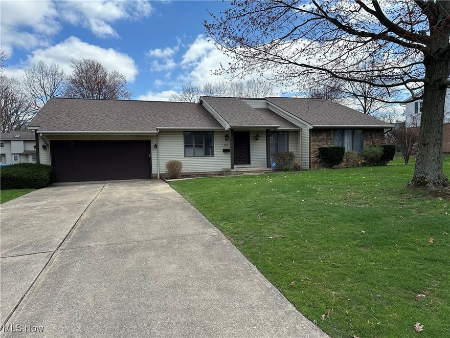 A rare find in Massillon's highly desired Colonial Hills neighborhood located on the NE side of town. The home is located in the Perry Local School District. This is a large ranch (1904 square feet) situated on a level lot with a 2-car attached garage. Entering the house into a hallway, there is a sunken living room to your left... move forward and enter a large family room, which is part of a very open floor plan that includes the dining area and kitchen. There is a newer "premium" sliding glass door off of the dining area that leads to the rear patio that overlooks a sizable back yard, with plenty of room for play or socializing. There is a built-in bookcase in the dining room that has additional storage in the lower half. There is also a large China cabinet that stays with the house. The kitchen has a ton of cabinet space providing plenty of room for dishes and cookware. Off of the kitchen is a pantry, laundry area and a hall that leads to a half bath, basement stairs, side door and garage. At the other end of the house, there is a long hallway that leads to the main bath and four bedrooms, providing great separation of the sleeping quarters and living areas. The large master bedroom had brand new carpeting installed in April 2025. The master BR also includes a full bathroom with 2 sinks and a walk-in closet. The rest of the carpeting in the house was professionally cleaned prior to the listing. The basement is huge with plenty of room to have a workshop, rec area and/or additional finished space. Due to signs of past water infiltration, the basement was water-proofed earlier this year and has a transferrable life-time warranty. The basement walls and floor were painted giving the basement a nice, clean look. There are 2 crawl space areas as well, providing for ample "out-of-sight" storage. These storage areas along with all of the closets, cabinets and pantry is a real plus! ADT Security system - must be activated.
Don't wait, this property won't last long!