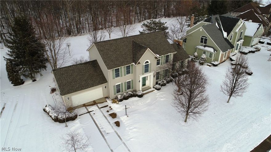 A beautiful colonial 4 bed 2+1/2 bath home in Medina. Invite yourself in to the large foyer with a coat closet on each side of the entry.  A living  room with new flooring and a large formal dining room are on either side.  Continue on to the kitchen with plenty of cabinets and counter space including a breakfast top granite island. Down the hall is the laundry room with utility sink and an entrance from the deck, a newly floored office and a half bath. The spacious eat-in kitchen is open to the great room with vaulted ceilings, a fireplace and access directly to the patio and deck. Perfect for any gathering.  A large backyard which backs up to a wooded ravine is a perfect place for some outdoor fun including your own concrete basketball area with hoop. Upstairs you will find all 4 bedrooms which includes a sizable master suite with shower, tub and also a 60 sq ft walk-in closet. This home will not last with all the upgrades that have recently been done including new roof July 2017.